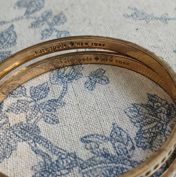 Kate Spade Gold and Cream Bracelets - Picture 2 of 4